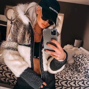 Faux fur designer jacket.